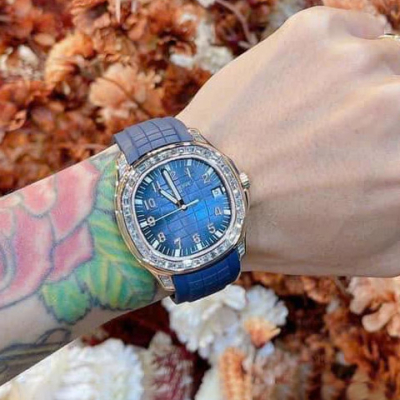 Custom Patek Philippe Aquanaut 5168G with Green Baguette Stones - Swiss Patek50 photo review